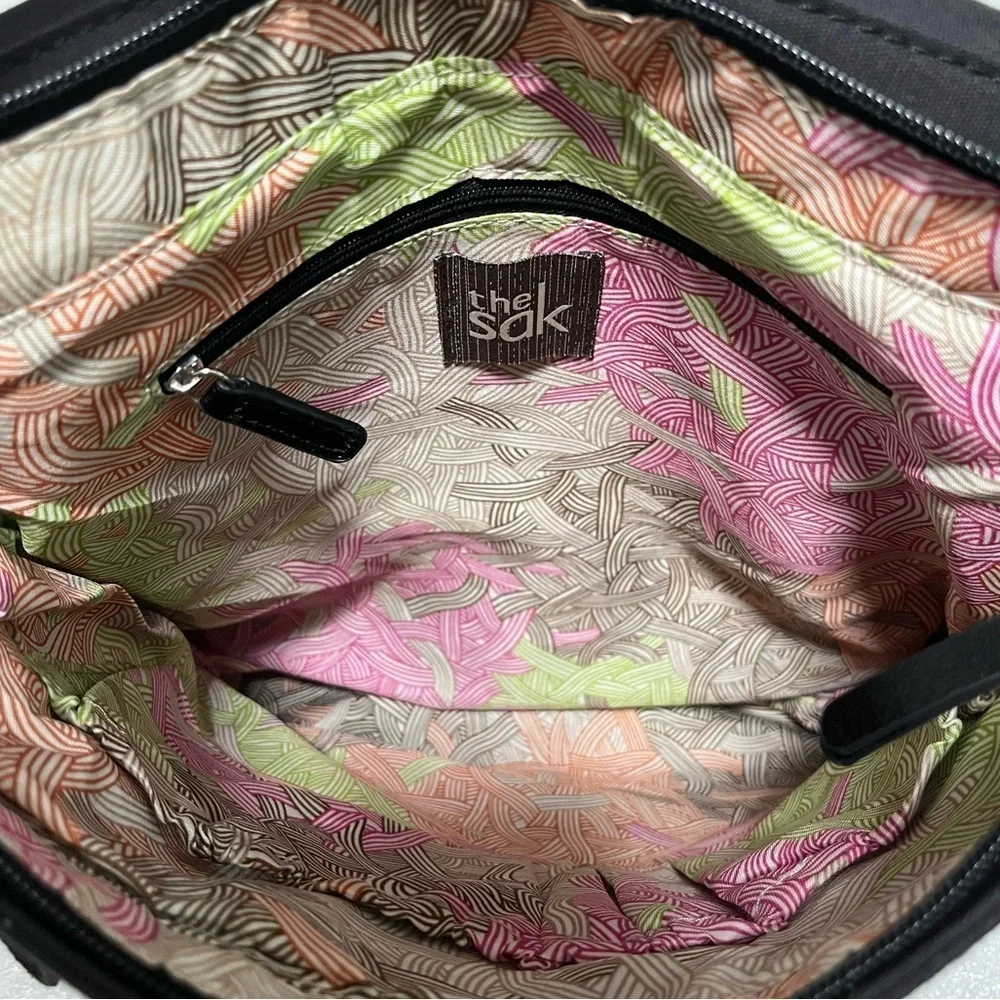 The Sak Ventura Stylish soft black leather Backpack messenger purse handbag